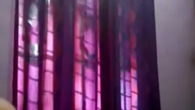 Tempting teen Desi lies down on her back to rub XXX body for sex show