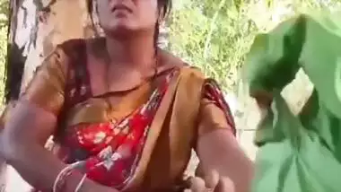 Outdoor sex of a handicapped man with a milf in the jungle