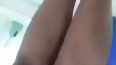 Beautiful desi girl lifting top to reveal sexy boobs