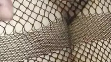 Hot Desi babe in fishnet dress has her pussy XXX rubbed by lover