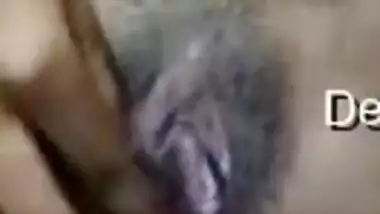 Desi housewife becomes excited and she plays with XXX orifice