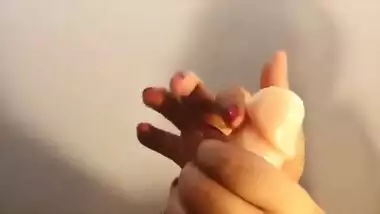 Desi woman receives sexual pleasure riding XXX toy with shaved pussy