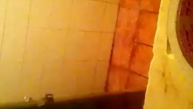 Girl spying on her stepmom having nude bath